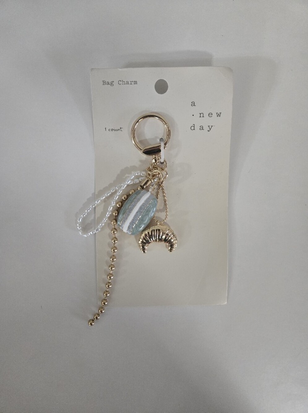 A New Day Gold & Light Blue Macaron and Croissant Bag Charm